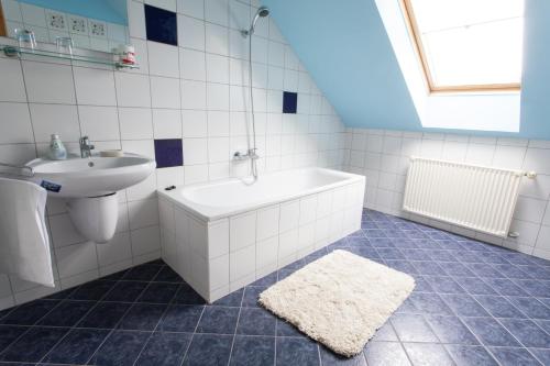 Kúpeľňa v ubytovaní AIDA Sport Apartman