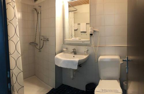 Ett badrum på Hotel Metropol