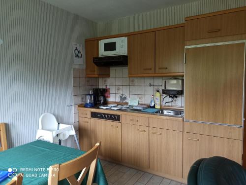 Una cocina o cocineta en Der Amboss