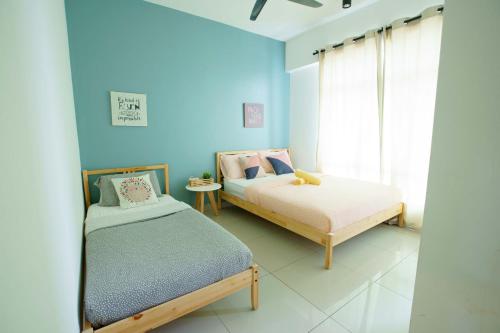 Katil atau katil-katil dalam bilik di Majestic Ipoh 3R2B by Migliore