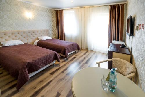 Postel nebo postele na pokoji v ubytování Guest House Shale