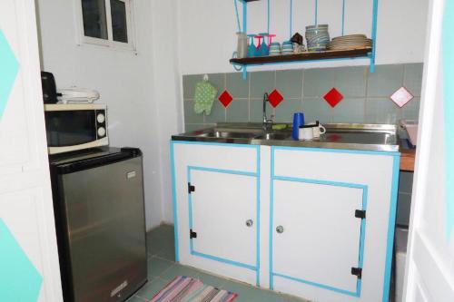 A cozinha ou cozinha compacta de Apartment Brazil Beach Front Paradise