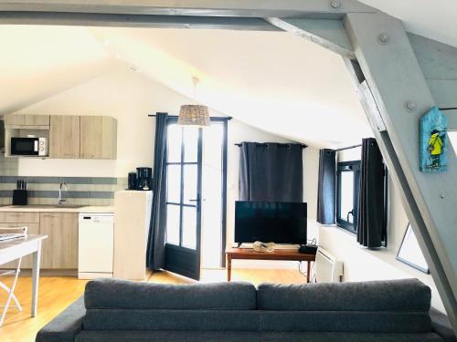 Dapur atau dapur kecil di Clos des Aigrettes -6 Gîtes de charme et confort à 30m du Port de La Cotinière