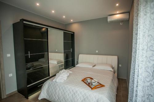 En eller flere senger på et rom på Villa Marmari 2