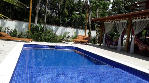 Bazén v ubytování Casa em condomínio com piscina privativa nebo v jeho okolí