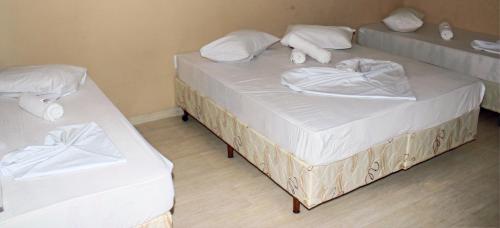 Hotel Santo Afonsoにあるベッド
