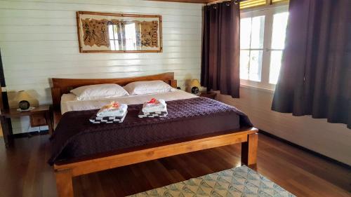 Postel nebo postele na pokoji v ubytování MOOREA - Villa Tereva Nui