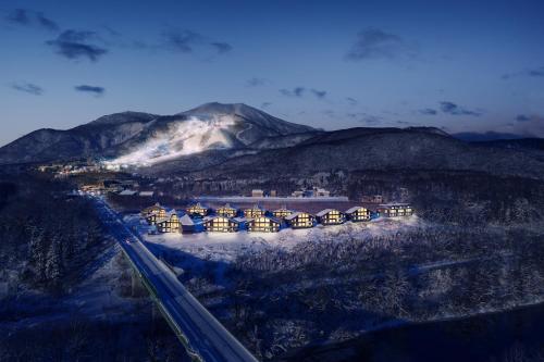an aerial view of a train station in the mountains at Panorama Niseko in Kutchan