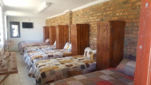 Postel nebo postele na pokoji v ubytování House, Cottage and Contractors Manor