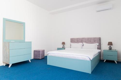 Postel nebo postele na pokoji v ubytování Maricel Astara Resort Hotel