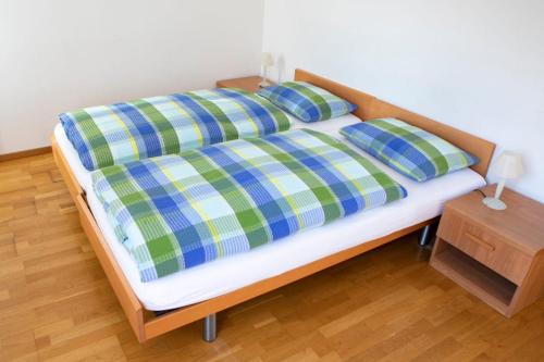 Posteľ alebo postele v izbe v ubytovaní BB Garni Motta