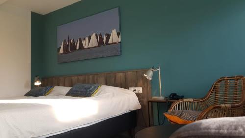 En eller flere senge i et værelse på HOTEL2Heerenveen
