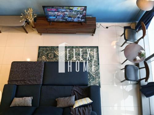 an overhead view of a living room with a couch at Pinnacle PJ, Romantic City View, 1-4 Guests Designed Duplex Home by Flexihome-MY in Petaling Jaya