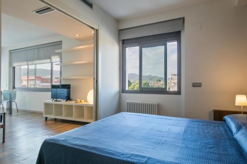 Ένα ή περισσότερα κρεβάτια σε δωμάτιο στο Apartamentos Marfina