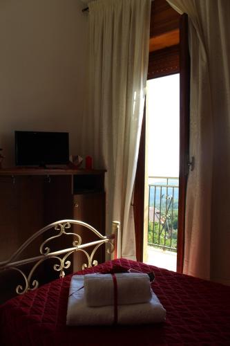 Postel nebo postele na pokoji v ubytování B&B Rosy Gallo