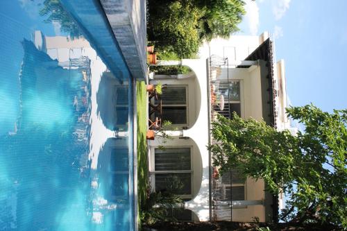 a view of the side of a building with a swimming pool at Villa Olevano in Ascona