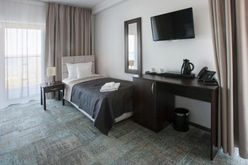 מיטה או מיטות בחדר ב-Rewita Korab
