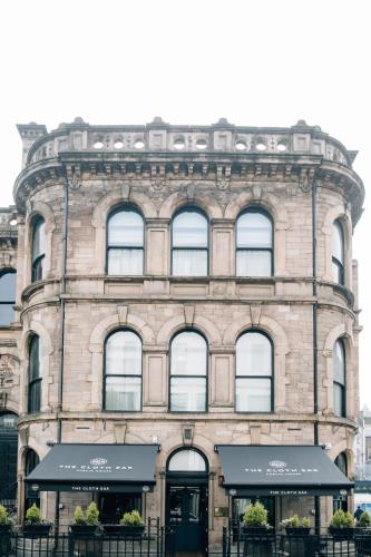 a large brick building with windows on the side of it at The Merchant Hotel in Belfast