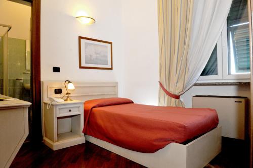 Postel nebo postele na pokoji v ubytování Albergo Birra