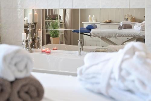 Ванная комната в Hotel- & Ferienanlage Kapitäns-Häuser Breege