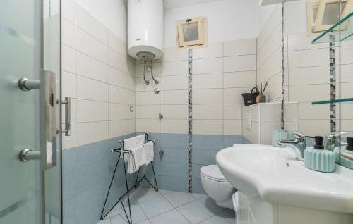 a bathroom with a sink and a toilet at Apartment Marino in Poreč