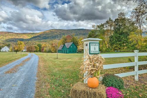 a sign that says please hay on a bale next to a road at Luxe Green Barn Near Skiing with Mt Equinox Views! in Manchester Center
