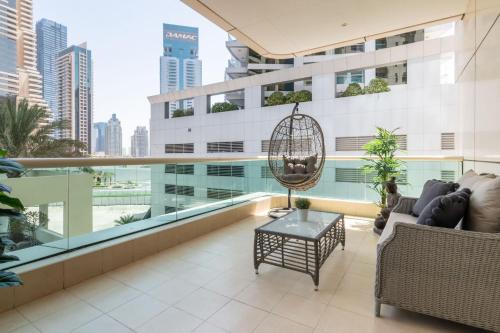 a balcony with a view of a building at GuestReady - Brown Sugar in Dubai