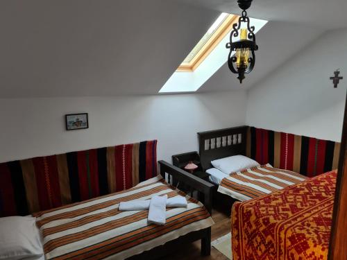 מיטה או מיטות בחדר ב-La Bunica
