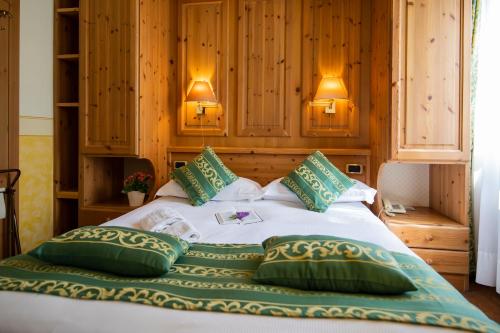 Postel nebo postele na pokoji v ubytování Hotel Villa Imperina
