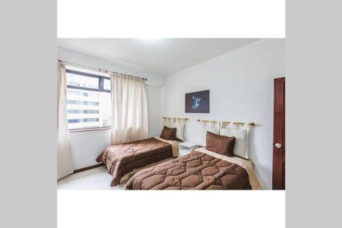 Cama o camas de una habitación en Amazing 2 bedroom Apartment Zona 14