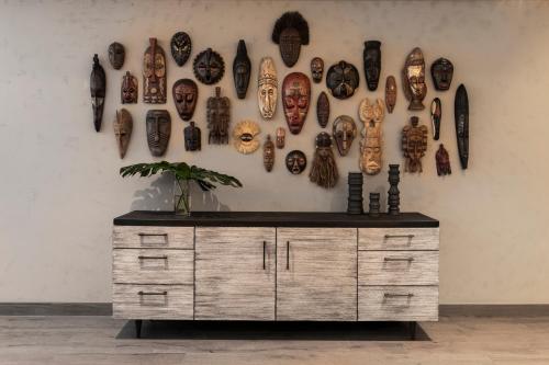 a wall with many different types of items on it at Kimpton Angler’s Hotel South Beach, an IHG Hotel in Miami Beach