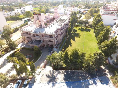 an aerial view of a large building with a park at Hotel Master Paradise, Pushkar, Rajasthan , INDIA in Pushkar