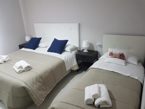 Кровать или кровати в номере Appartamento Galeotti 18