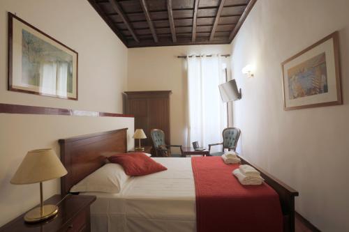 Cama o camas de una habitación en Borgo Pio 91