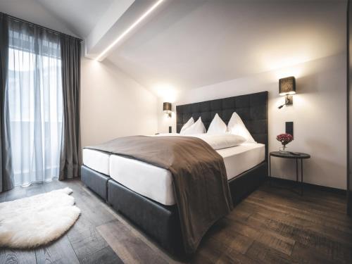 Postel nebo postele na pokoji v ubytování Appartementhaus Das Vidum