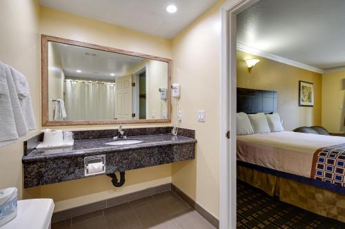 Kylpyhuone majoituspaikassa Hacienda Inn