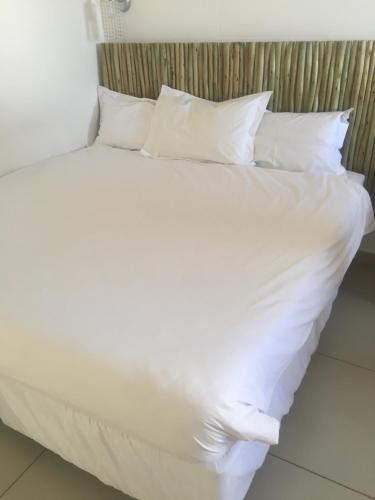 Ein Bett oder Betten in einem Zimmer der Unterkunft Pandeinge