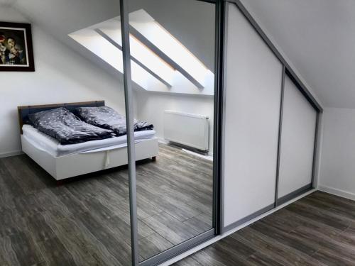 Posteľ alebo postele v izbe v ubytovaní Apartament Julia