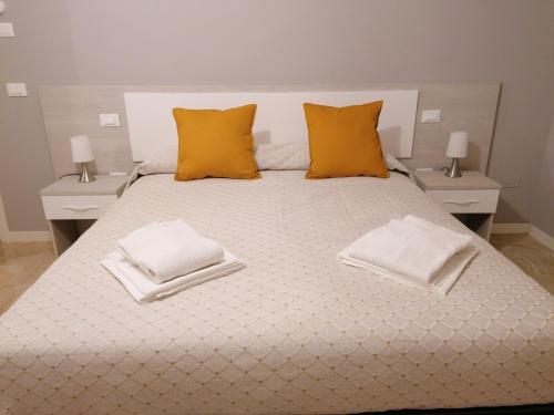 Ένα ή περισσότερα κρεβάτια σε δωμάτιο στο Italaforesteria