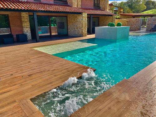 Φωτογραφία από το άλμπουμ του 2 Apartamentos en villa con piscina privada en Asturias El Marquesau σε Noriega