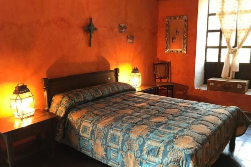 Postelja oz. postelje v sobi nastanitve Hacienda San Juan Pamba