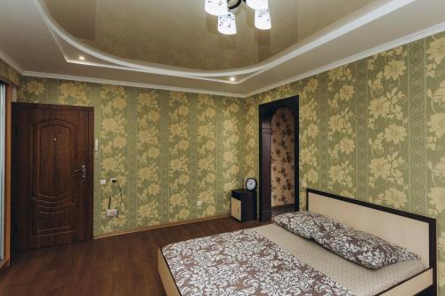 Ένα ή περισσότερα κρεβάτια σε δωμάτιο στο Apartments Faraon neer Manufaktura