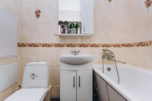 Ένα μπάνιο στο Apartments Faraon neer Manufaktura