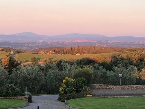 a view of the countryside from the garden of a house at Podere La Casa in Villa dʼArceno