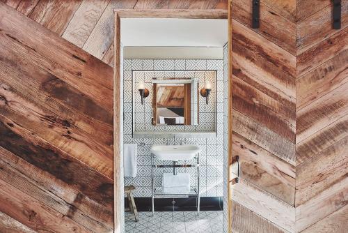 a bathroom with a sink and a mirror at No.26 By The Sea in Oban