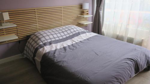 Кровать или кровати в номере Aligre