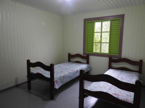 Giường trong phòng chung tại Sítio Refúgio da Onça - Serra da Bocaina - Bananal