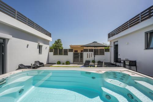 Πισίνα στο ή κοντά στο Nectar Luxury Residence