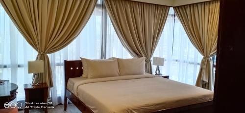 Katil atau katil-katil dalam bilik di KL Times Square Apartment
