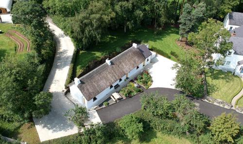 an overhead view of a house with a roof at Rosies Cottage in Maghera